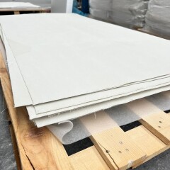 AllShield BarrierSheets provide protection beneath roofing against solar panel fire risks and flying sparks in commercial buildings.