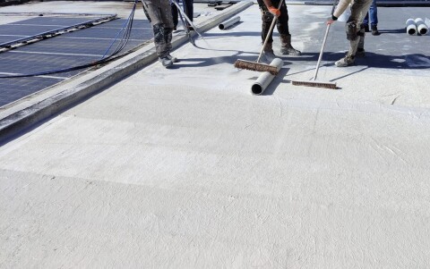 Applying AllShield Blue, FM 4484 & FM 4482 Approved mineral coating, to a commercial roof makes it fire-safe against solar panel fire risks.